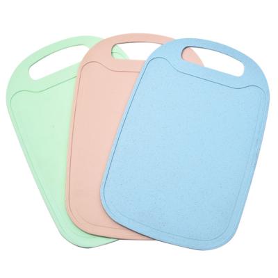 China Eco-friendly Colorful Plastic Multi-Functional Sustainable Wheat Straw PP Vegetable Chopping Board for sale