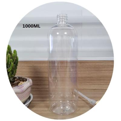 China Personal Care 1000ml Round Empty Lotion Pump Bottles Clear Skin Care Shampoo Bottle With Plastic Pumps for sale