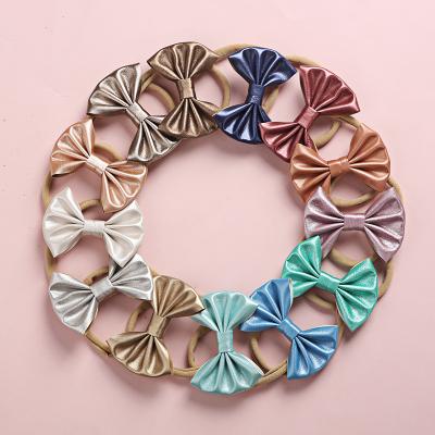 China PU Nylon Daily Bow Hair Accessories Babies Hair Decoration Beauty Elastic Headbands For Kids for sale