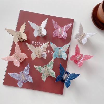 China Ladies Hair Decoration Butterfly Glitter Trending Transparent Color New Cute Hair Accessories Non Slip Acetate Hair Claw Marble Clips For Women Girls for sale