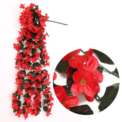 China Environmental simulated wall hanging decoration with artificial flowers and rattan for sale