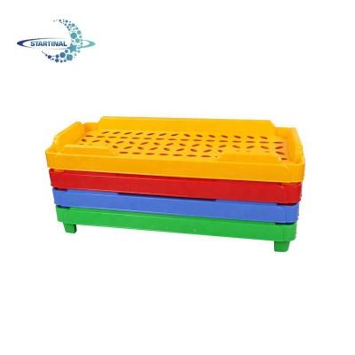 China Custom Stackable Plastic Kids Children Colorful Kids Bed For Kindergarten for sale