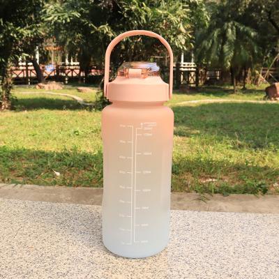 China OEM 64oz Sustainable Gradient Motivational Sports Water Bottle With Handle, Plastic Suitable For Gym And Camping for sale