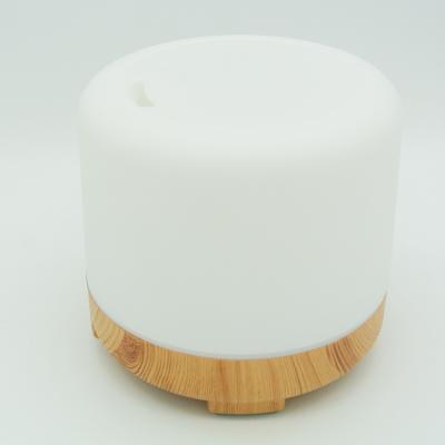 China Hotel Shenzhen Home Appliance Wooden Base 120ml Oil Diffuser With Light for sale