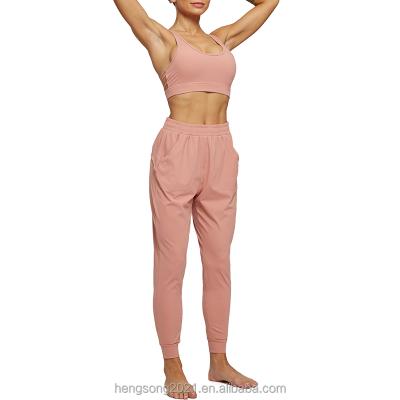 China Breathable spot high elastic loose leg small pants breathable running buttocks nine minute summer new nude sports women s pants casual pants for sale