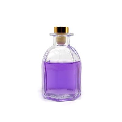 China Reed Diffuser Wholesale Home Decoration Round Tubular Glass Diffuser Bottle With Cap for sale