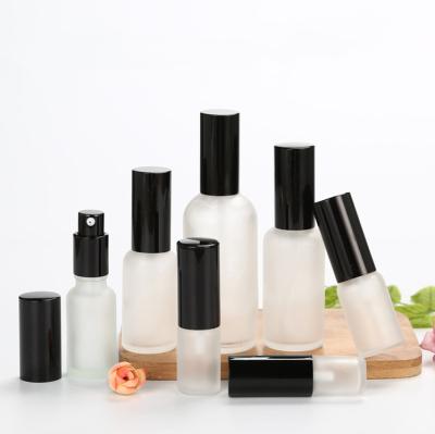 China Essential Oil Cosmetic Perfume Bottle Filling Pump Personal Care Packaging Empty Glass Bottle for sale