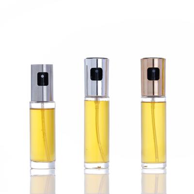 China Stocked Oil Dispensing Glass Olive Bottle For Cooking Grill Food Grade Glass Spray Lid Bottle for sale