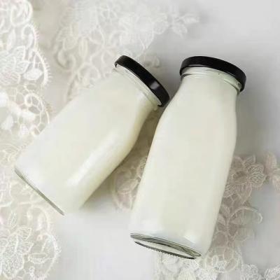 China Wholesale Square Cool Beverage Shape 300ml Milk Bottle Glass With Metal Lid for sale