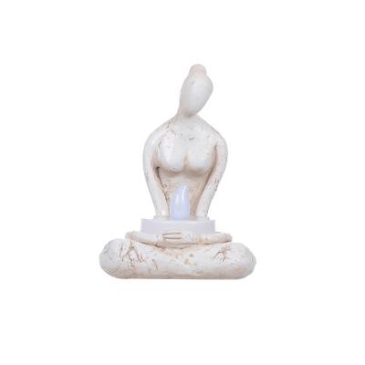 China Europe Resin Meditation Yoga Candle Holder Modern Abstract Desktop Figurine for sale