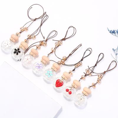 China 6ML Car Flower Perfume Bottle Car Pendant Hanging Perfume Bottle Hanging Essential Oil Pendant 6ml for sale