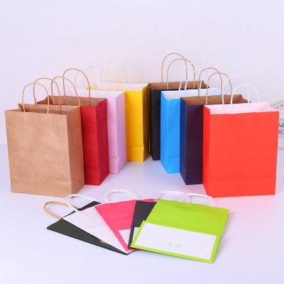 China Wholesale Cheap Disposable Pink/Recyclable Kraft Paper Bag Black/Blue White Kraft Paper Bags With Twisted Handle for sale