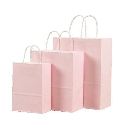 China Disposable Kraft Paper Food Bakery Packaging Bags Custom Logo Printed Square Pink Paper Shopping Bag With Handles for sale