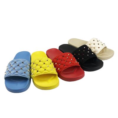 China Fashion Trend Wholesale Cheap Rivets Slippers Slides For Women Fashion Summer Outdoor Sandals For Ladies Flat Slipper Amazon eBay Custom Stats for sale