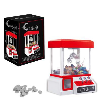 China New 3+ Plastic Candy Ball Grabber Machine LED Toys With Light And Musical for sale