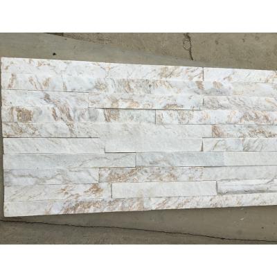 China Modern Line Snow White Gold Natural Marble Stone Stacked Stone Cladding Outdoor Fireplace for sale