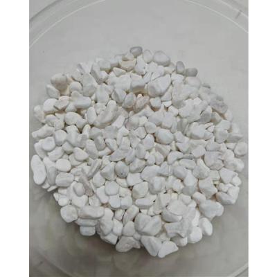 China Modern Chinese Small Size Natural Snow Pebble White Marble Stone Landscaping Garden White Rocks for sale