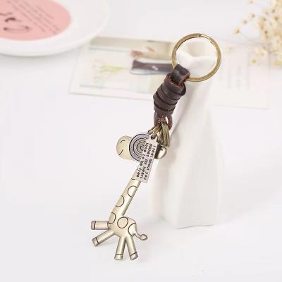 China Simple Vintage Bronze Cute Giraffe Pendant Creative Gifts Simple Leather Key Chain for sale