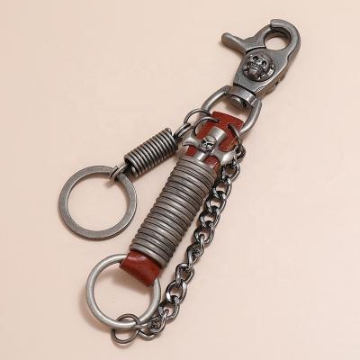 China Retro And Punk Leather Car Key Chain Men And Skull Punk Metal Plush Women Accessories Retro Key Pendants for sale