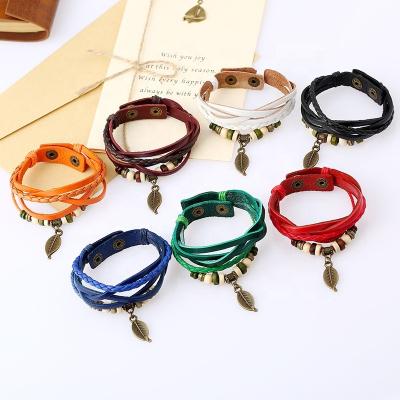 China Vintage Watch Band Student Jewelry Personalized Single Layer Woven Leaf Woven Pendant Leather Bracelet for sale