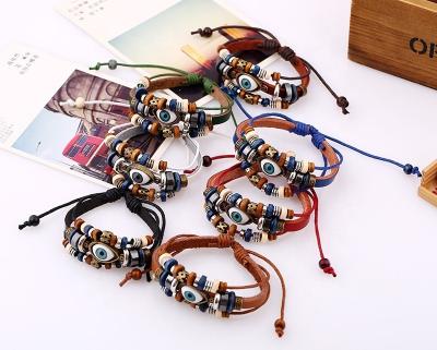 China Casual/Sporty Hot Selling Metal Beaded Wax Eyes Multiple Wood Bead Rope Leather Color Options Bracelet for sale