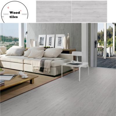 China 200x1000mm Gray Wood Grain Tile low water absorption glazed metallic ceramic tiles living room and bedroom porcelain floor tiles for sale