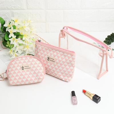 China Madame Korean version of the letter portable transparent beauty bag small cosmetic travel for sale