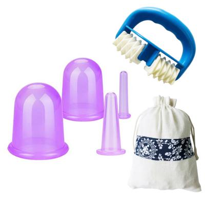 China Cellulite Massager Back Brush Body Handheld Plastic Roller Massager With Cupping for sale