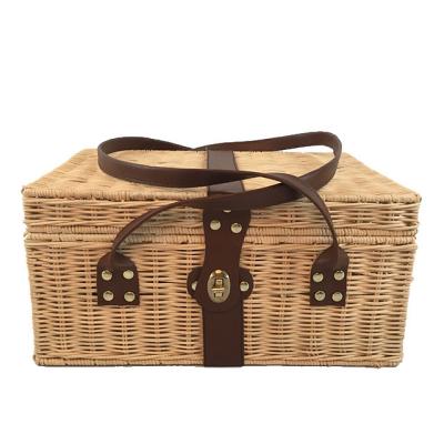 China Sustainable Leather Strap Rattan Storage Basket Handwoven Picnic Storage Basket for sale