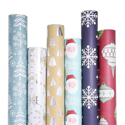 China Handmade Custom Printed Ornaments Roll Christmas Silver and Gold Snowflakes Wrapping Paper Gift for sale