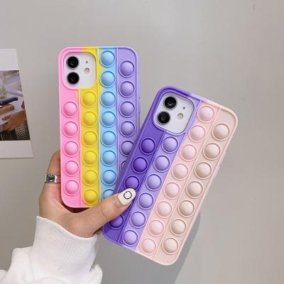 China Creative Anti-fall new arrival soft silicone rainbow push bubble fidgety person toys phone case for Iphone 11/12 pro max for sale