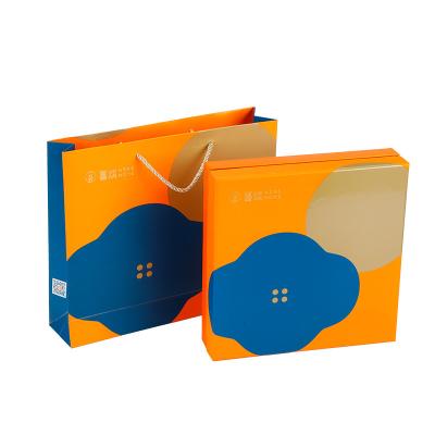 China Wholesale High Quality Recyclable Orange Cardboard Food Gift Shopping Paper Bag for sale