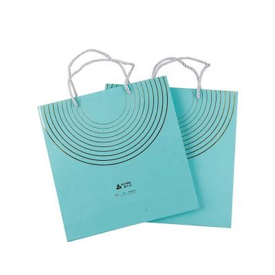 China Custom Logo Luxury Paper Bag Fancy Wholesale Cheap Price Recyclable Wedding Favor Door Paper Gift Bag With Handles for sale