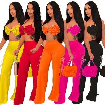 China 2022 New Arrivals Breathable Fashion Women Sexy Wrap Chest Side Ripped Drawstring Flare Pants 2 Piece Set Suit for sale