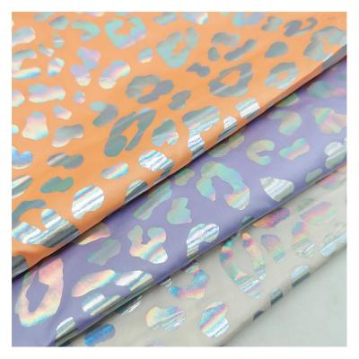 China Shrink-Resistant Foil Printing 300T Polyester Pongee Fabric Colorful Glitter Leopard Print Fabric For Garment / Lining for sale