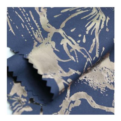 China Customizable Gold Foil Printing Fabric Polyester Pongee Tear-Resistant Fabric For Garment for sale