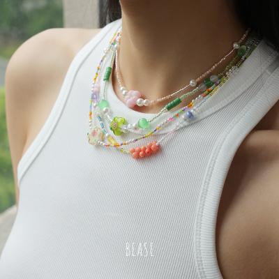 China 18K Gold INS Summer Holiday Colorful Beaded Flower Nickel Free Brass-Plated Pendant Necklace For Women for sale