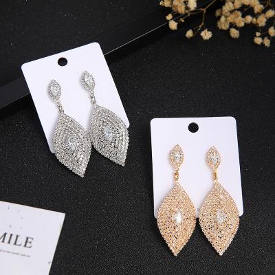 China 2023 Popular Full Diamond Stud Earrings Tassel Claw Chain Environmentally Friendly Luxury Earrings For Women for sale