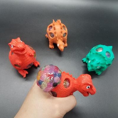 China New Mesh Ball Bead Fidget Pop Toy Dinosaur Toys Squeeze Dinosaur Ball Toys From Yiwu Plastic Supplier for sale