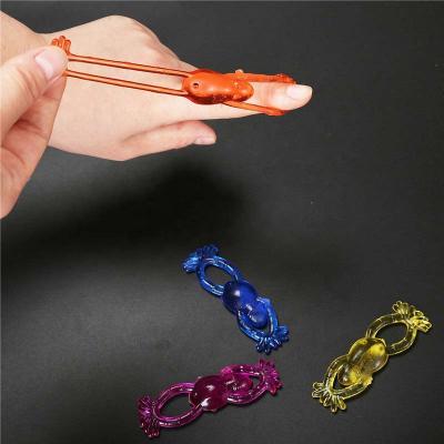 China Wholesale TPR Stretchable Sticky Slingshot Frog Animal Flying Toy for sale