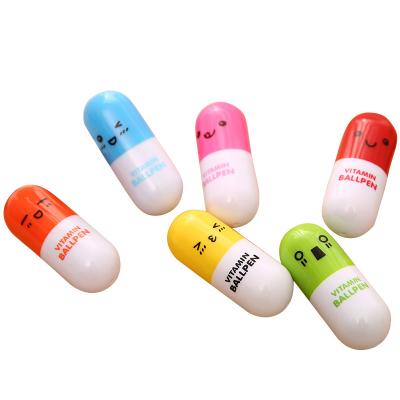 China Pill Pen Ballpoint Pen Cartoon Pen Telescopic Mini New Cute Expression Creative for sale