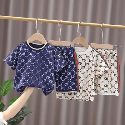 China Anti-static hot sale 2022 new children's short-sleeved suit sports breathable T-shirt baby shorts clothes summer children's wear T778 for sale