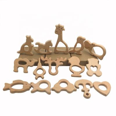 China Baby Wooden Toy Wish Amazon Hot Sale Beech Soft Animal Shape Teether Toy Wood Dog Teething Toys For Baby for sale