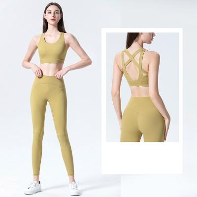 China Fitness Breathable Naked Feeling Gym Set Women's High Quality Skinny Stylish Compression Sports Bra Set for sale