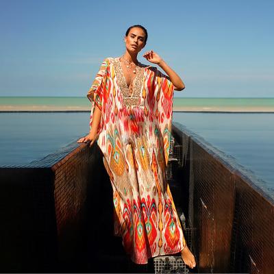 China Summer Anti-Static Ethnic Bohemian Floral Breathable V-Neck Spring Print Batwing Kaftan Wing Batwing Sleeve Vacation Low Cut Half Dress for sale