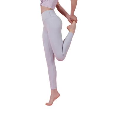 China Breathable 2023 hot selling good price Women's Customized Ten Color High Waist Tight Cloud Dried Yoga Suit Nude Pants  yoga pants for sale