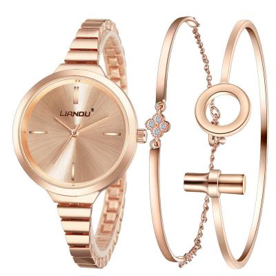 China Women's Rose Gold Unique Design Thin Ladies Watches For Girl Metal Hand Strap Wristwatch Gift Set Chain for sale