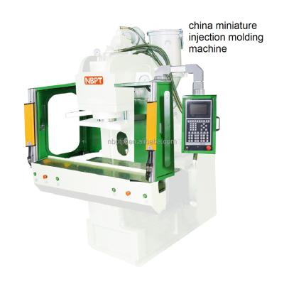 China Miniature VERTICAL porcelain injection molding machine for sale