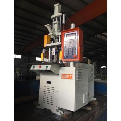 China Small Vertical Plastic Injection Molding Machine Price VERTICAL 15T for sale