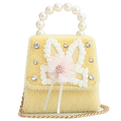 China Cute flower pearl plush plush velvet girl's latest fashion ANMAI fasion ANMAI diagonal diagonal handbag for sale